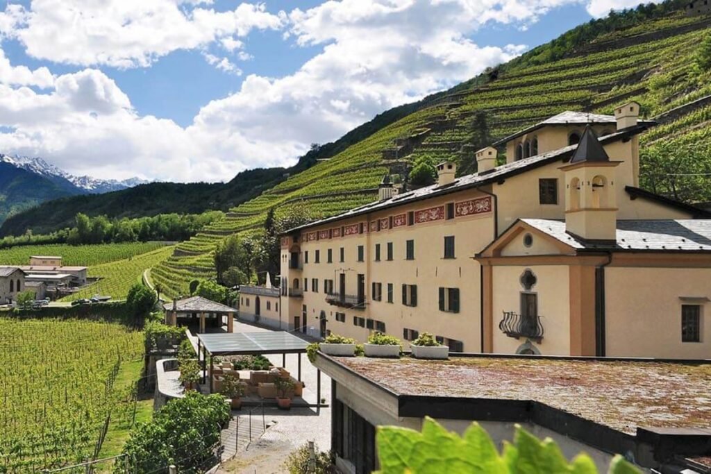 Alpine terraced vineyards in Valtellina with historic estate — Northern Italy Wine Tour experience
